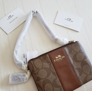 New leather coach wristlet in original packaging